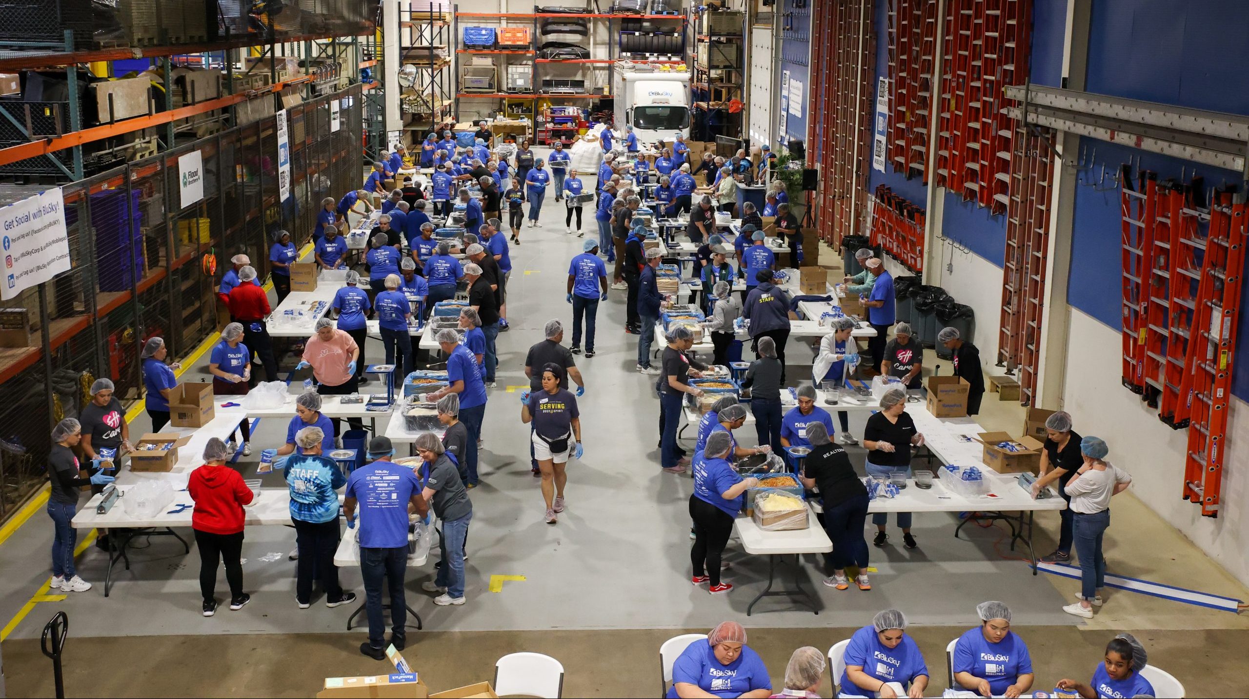 BluSky Chicago Office Succeeds in Packing Over 101,000 Life-Saving Meals
