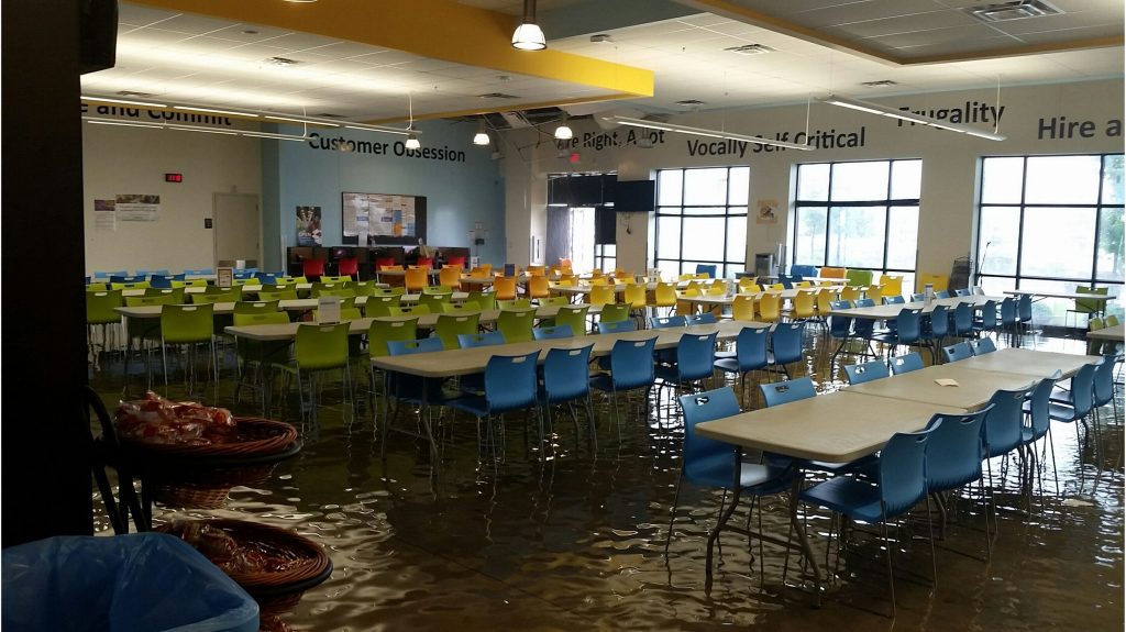 flooded facility in need of commercial water damage restoration