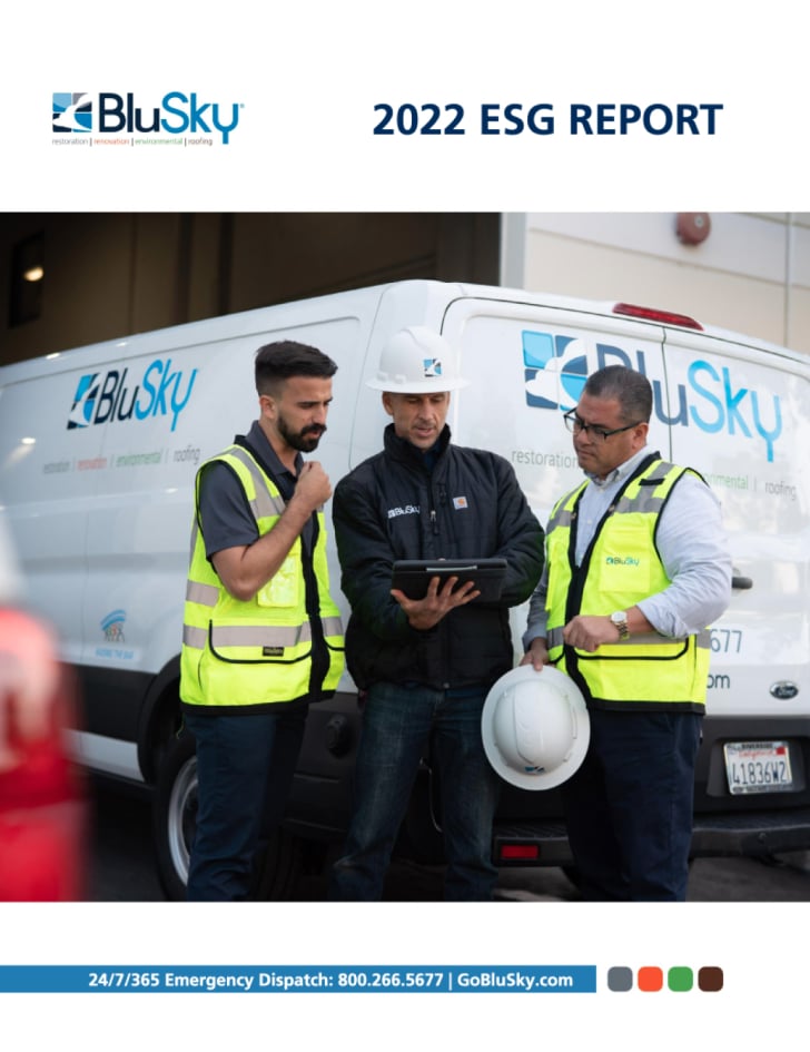 three blusky employees looking on tablet