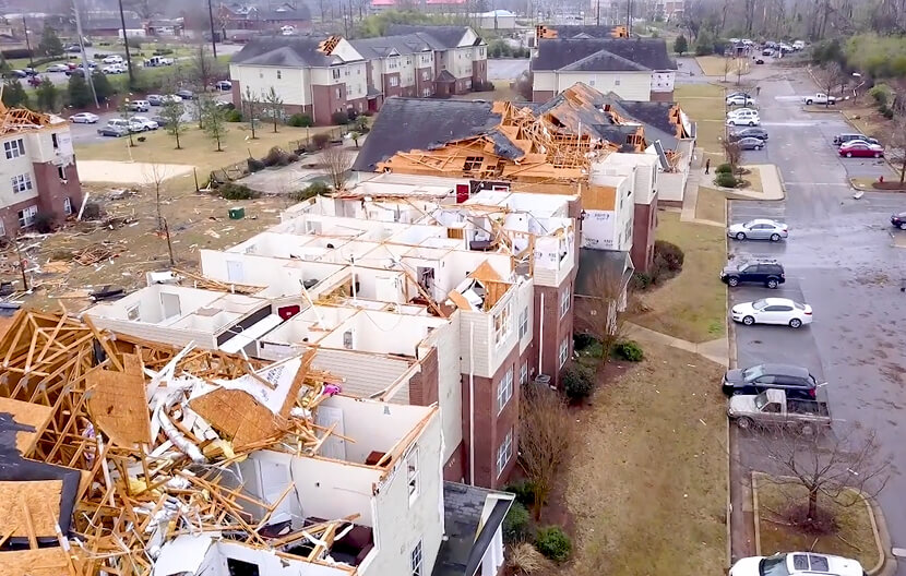 college apartments at Jacksonville State with missing roofs after tornado