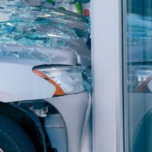 car crashing through retail facility
